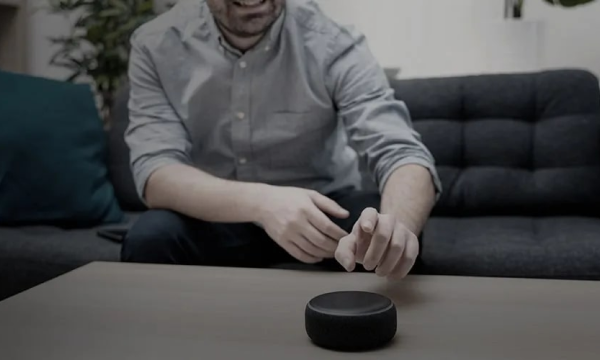 Person interacting with an alexa image